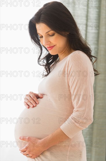 Portrait of pregnant woman.