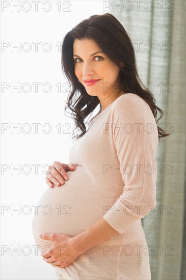 Portrait of pregnant woman.