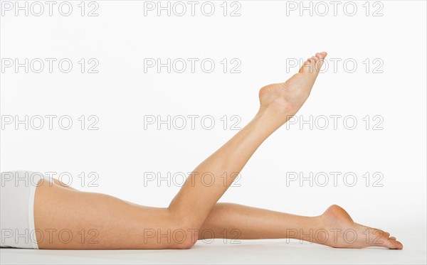 Studio shot of young woman's legs.