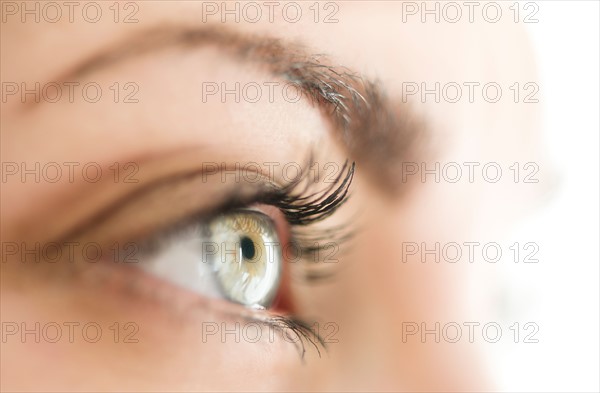 Studio close-up of woman's eye.