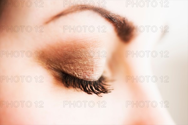 Studio close-up of woman's eye.