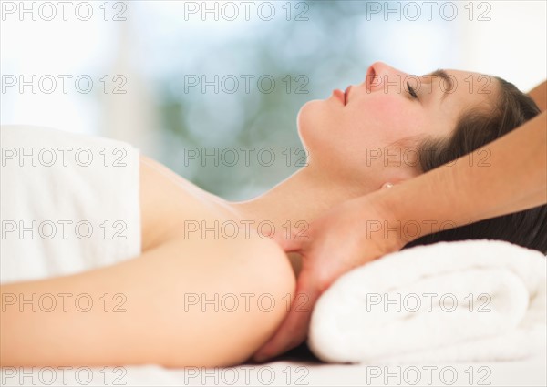 Woman receiving massage.