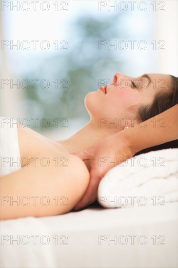 Woman receiving massage.