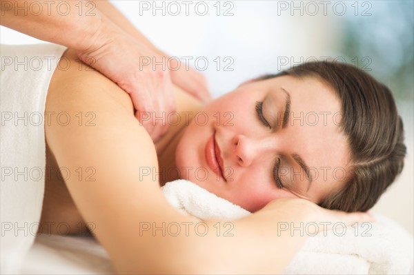 Woman receiving massage.