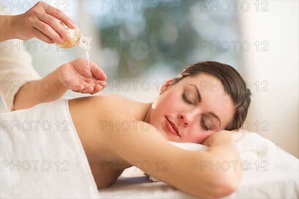 Woman receiving massage.