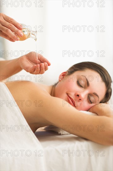 Woman receiving massage.