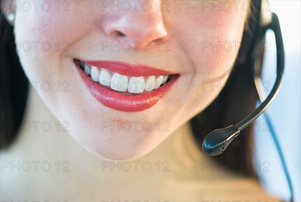 Close-up of female customer service representative.