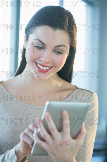 Woman using tablet pc.