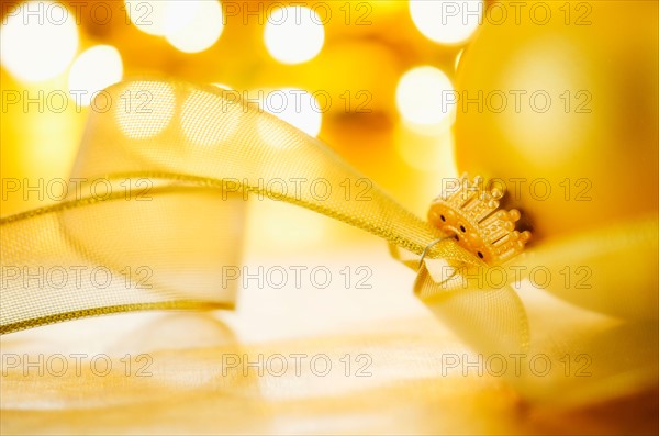 Close-up of Christmas ball with ribbon, studio shot.