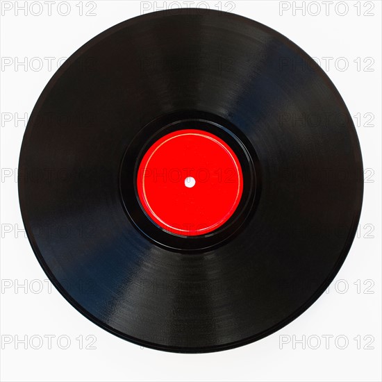 Vinyl record on white background, studio shot.