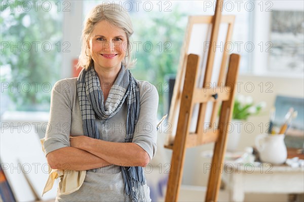Portrait of senior woman in art studio.
