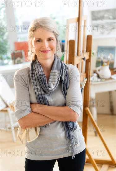 Portrait of senior woman in art studio.