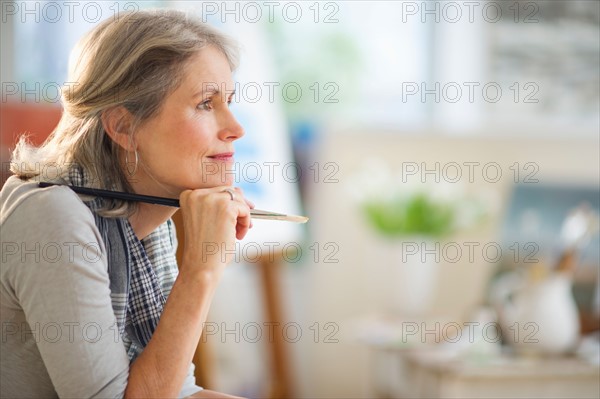 Portrait of senior woman in art studio.