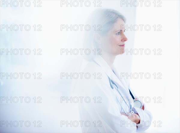 Portrait of senior female doctor .