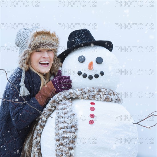 Portrait of woman with snowman.