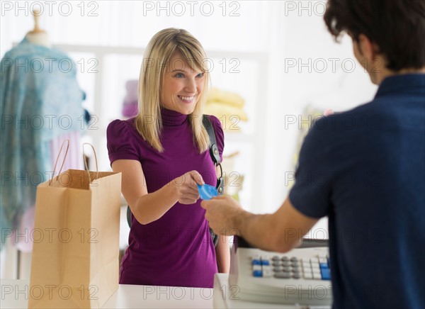 Man paying with credit card.
