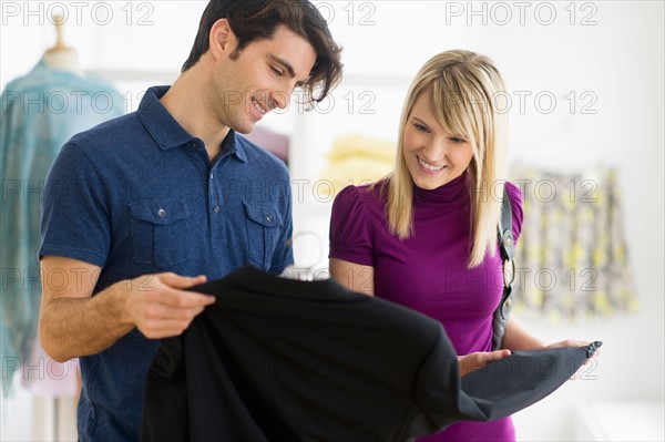 Couple in clothes store.