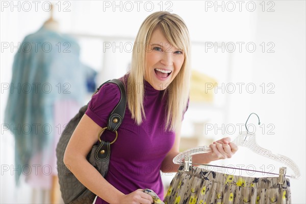 Woman in clothes store.