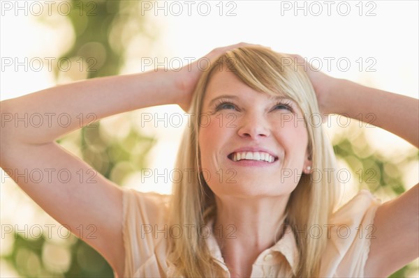 Portrait of smiling woman.