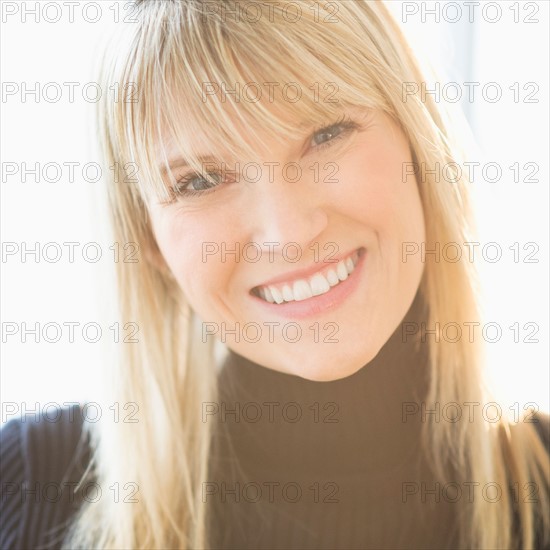 Portrait of woman smiling.