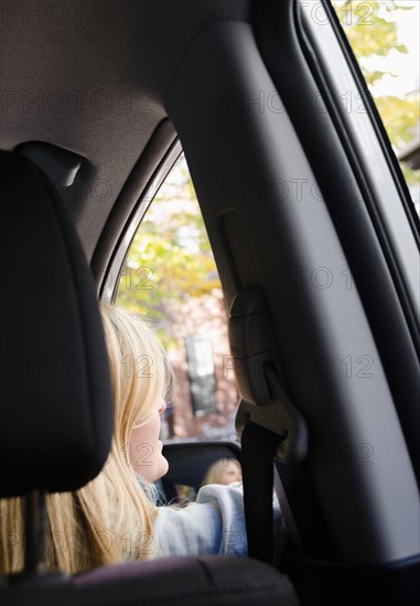 Woman in car. Photo : Jamie Grill