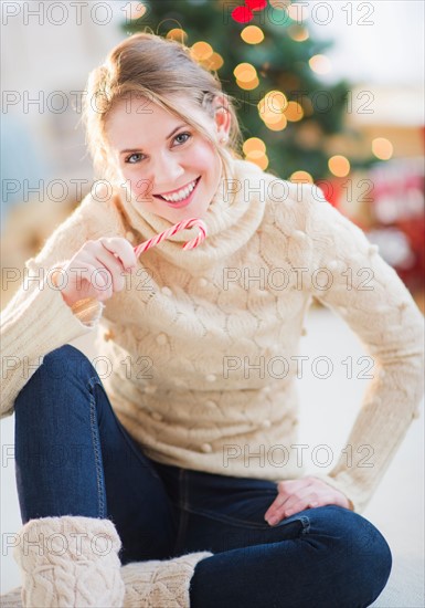 Portrait of beautiful woman wearing wooly sweater. Photo : Daniel Grill