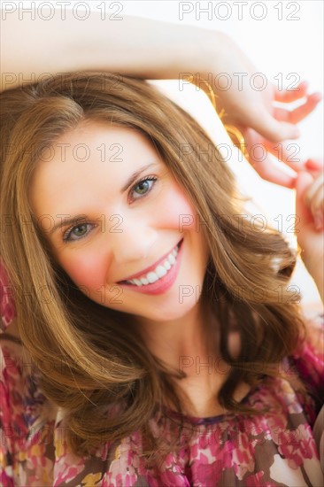 Portrait of smiling young woman. Photo : Daniel Grill