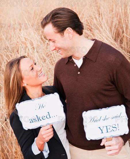 Young couple flirting on wheat field. Photo : Daniel Grill