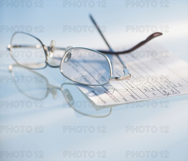 Studio shot of spectacles and prescription. Photo : Daniel Grill