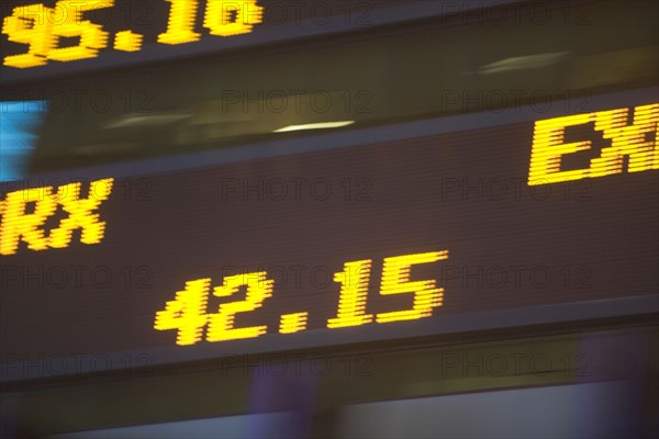 Usa, New York State, New York City, Times Square, Stock Quotron, close-up of Ticker Tape Machine. Photo : fotog