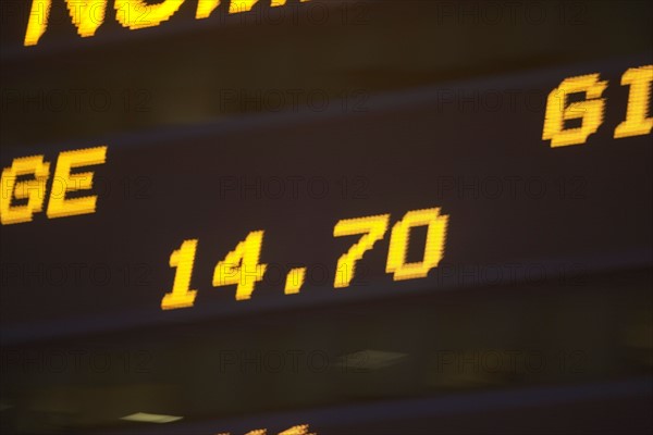 Usa, New York State, New York City, Times Square, Stock Quotron, close-up of Ticker Tape Machine. Photo : fotog