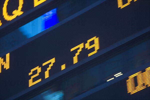 Usa, New York State, New York City, Times Square, Stock Quotron, close-up of Ticker Tape Machine. Photo : fotog