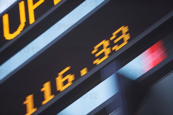 Usa, New York State, New York City, Times Square, Stock Quotron, close-up of Ticker Tape Machine. Photo : fotog