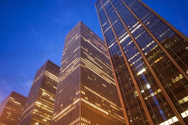 USA, New York State, New York City, 6th avenue at night, low angle view. Photo : fotog