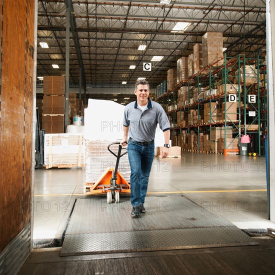 Man working in warehouse.