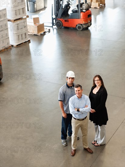 Portrait of warehouse workers.