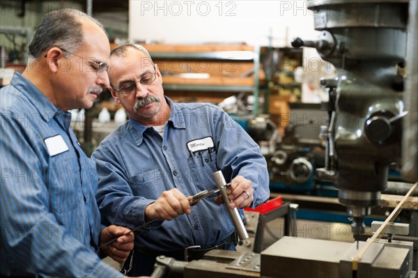 Skilled workers in factory.