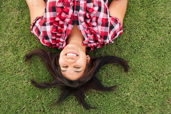 Young smiling woman looking at camera. Photo : Sarah M. Golonka