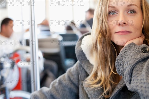 Portrait of woman in subway train. Photo : Sarah M. Golonka