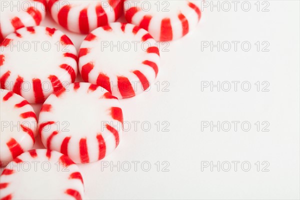 Red and white candies, studio shot. Photo : Sarah M. Golonka