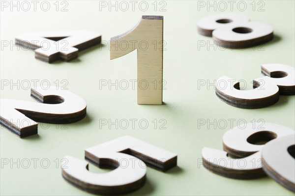 Numbers on white background, studio shot. Photo : Kristin Lee