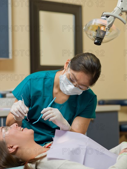 Dentist and patient in dental surgery. Photo : Dan Bannister