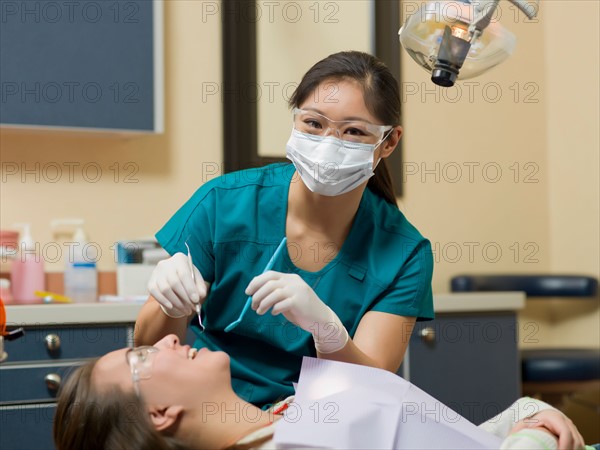 Dentist and patient in dental surgery. Photo : Dan Bannister