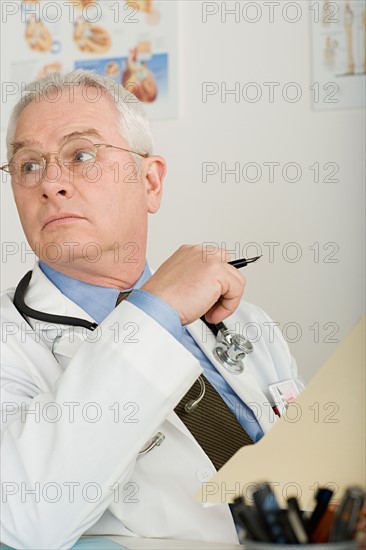 Senior doctor in office. Photo : Rob Lewine