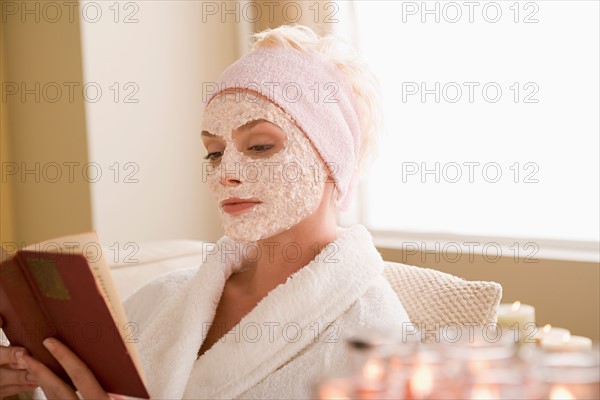 Woman reading book in spa. Photo : Rob Lewine