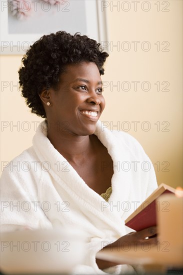 Woman relaxing in spa. Photo : Rob Lewine