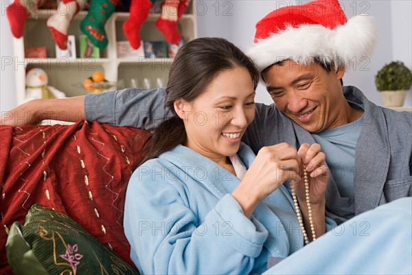 Smiling couple at Christmas morning. Photo : Rob Lewine