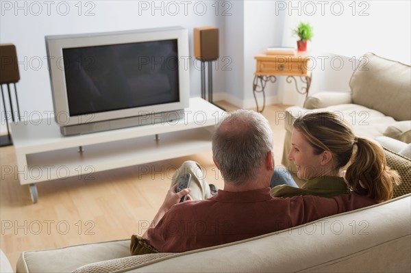 Portrait of couple embracing. Photo : Rob Lewine