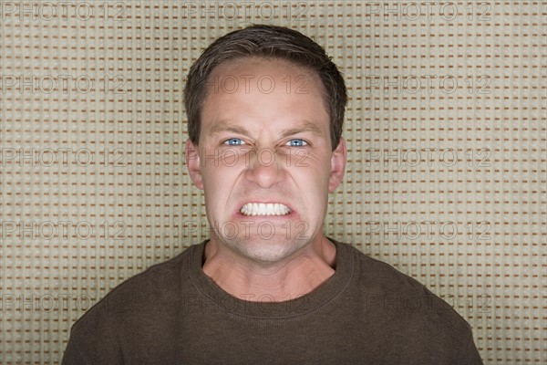 Portrait of angry man. Photo : Rob Lewine