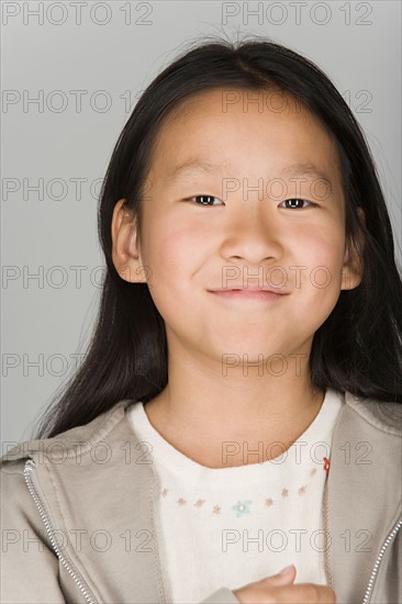 Portrait of smiling teenage girl. Photo : Rob Lewine